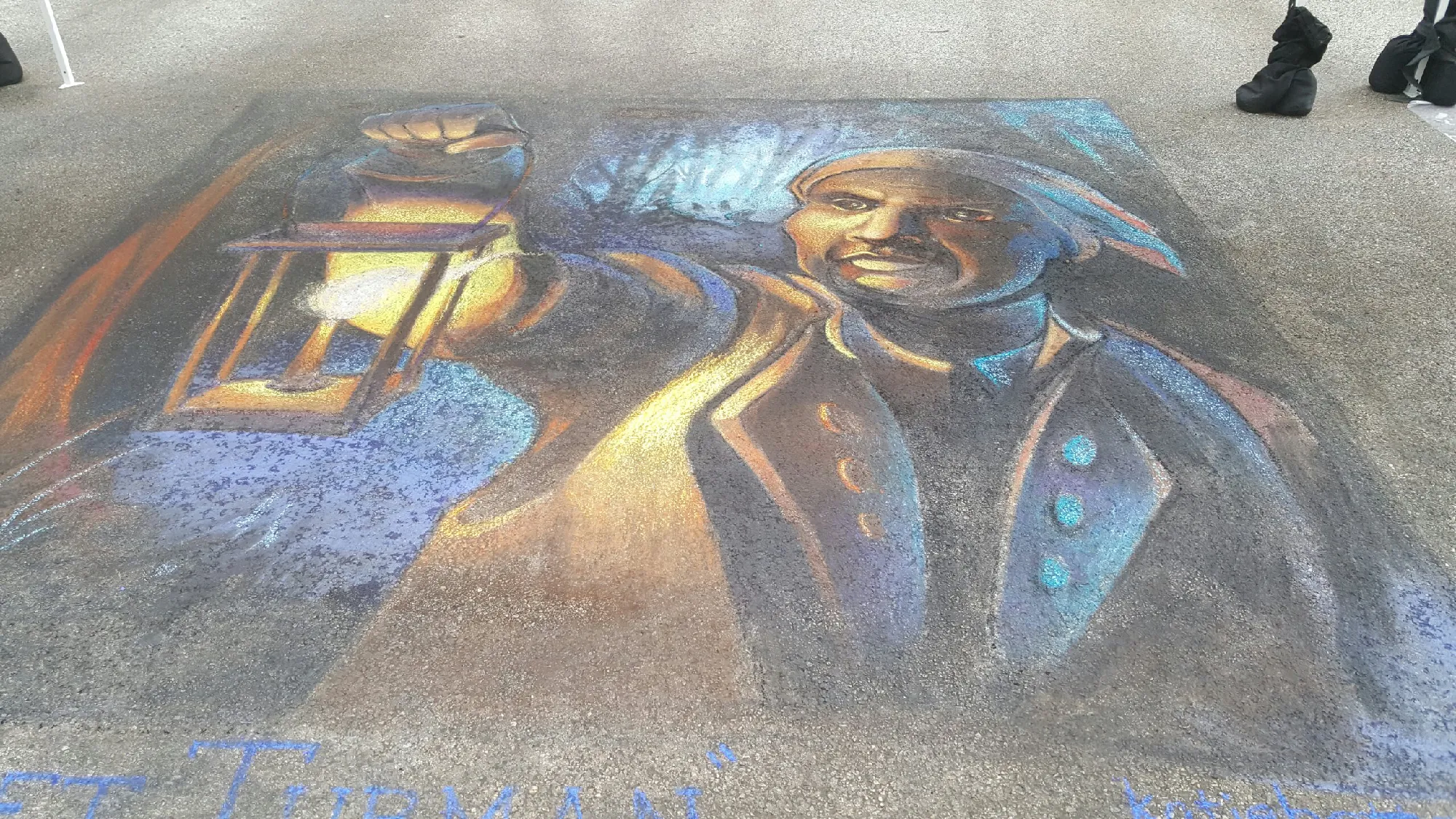 Madonnari street chalk art created during a Little Italy arts festival